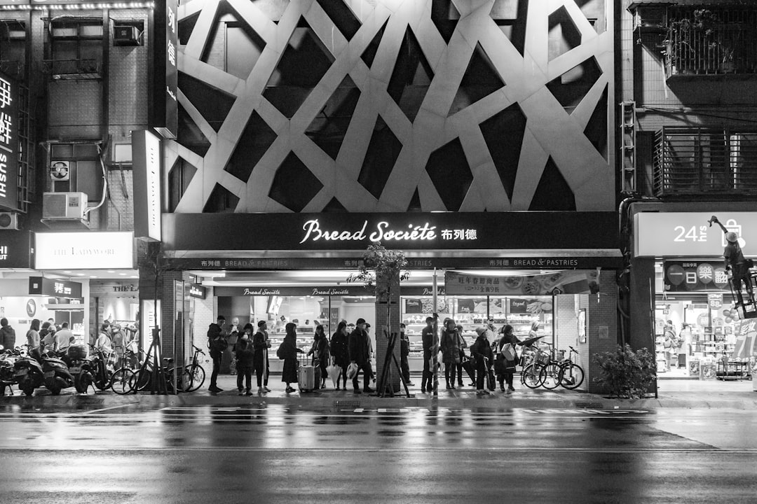 a group of people standing outside a building