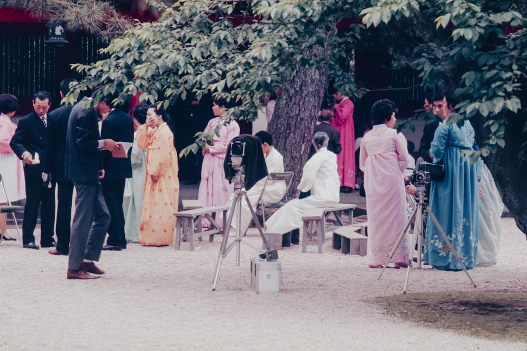 A group of people standing around each other