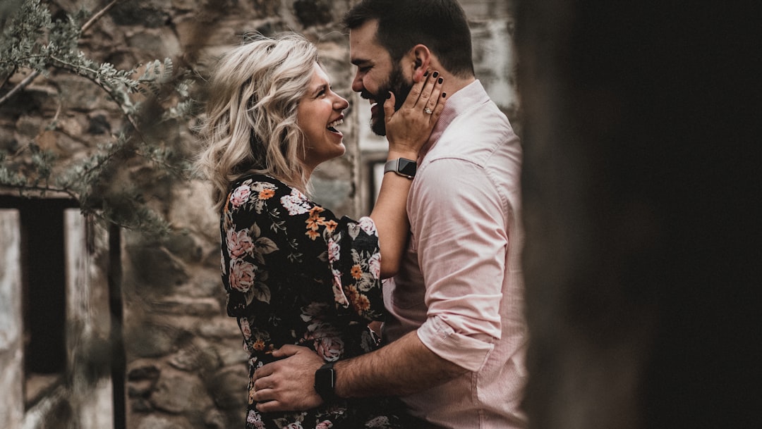 a man and a woman standing next to each other
